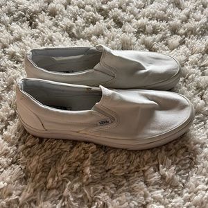 white slip on Vans